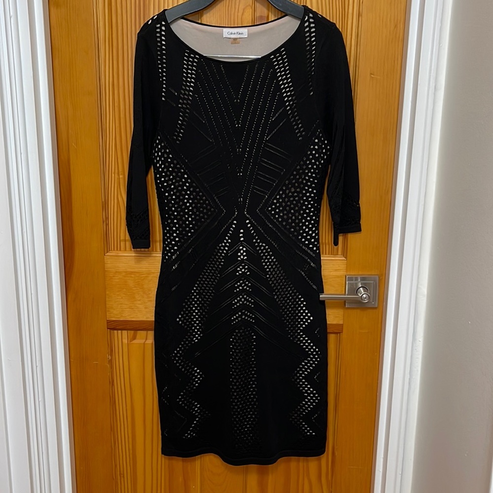 Black and naked lining dress it fit like a glove thick form fitting material